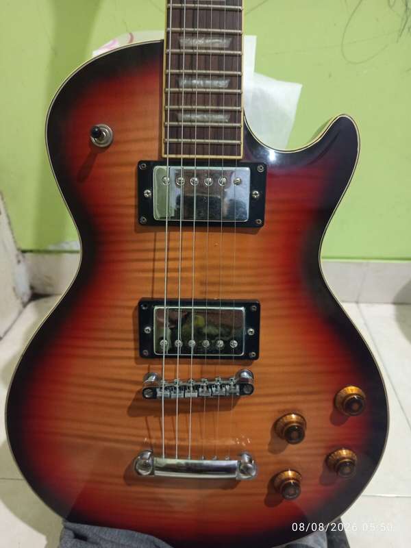 Squier Series 24 M-77 (Cherry Sunburst) owned by Ary W.