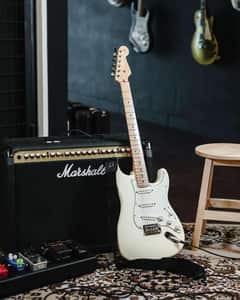 Collection of various Fender guitar models including Stratocaster and Telecaster